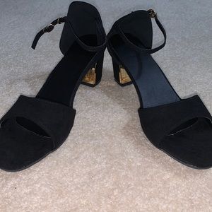 Gold and black peep toe heels